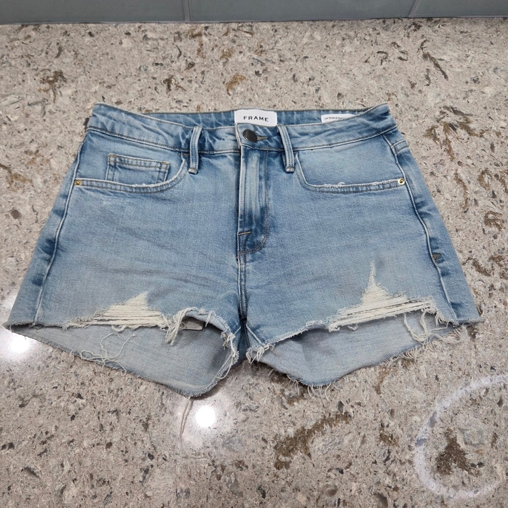 FRAME Le Grand Garcon Denim Shorts Bathe Light Wash Distressed Raw Hem Size 24